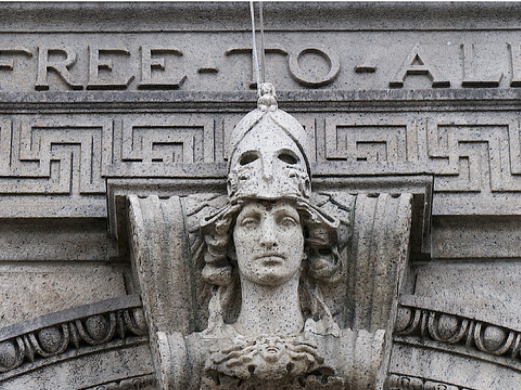 Close photograph of the Boston Public Library with the heading FREE TO ALL