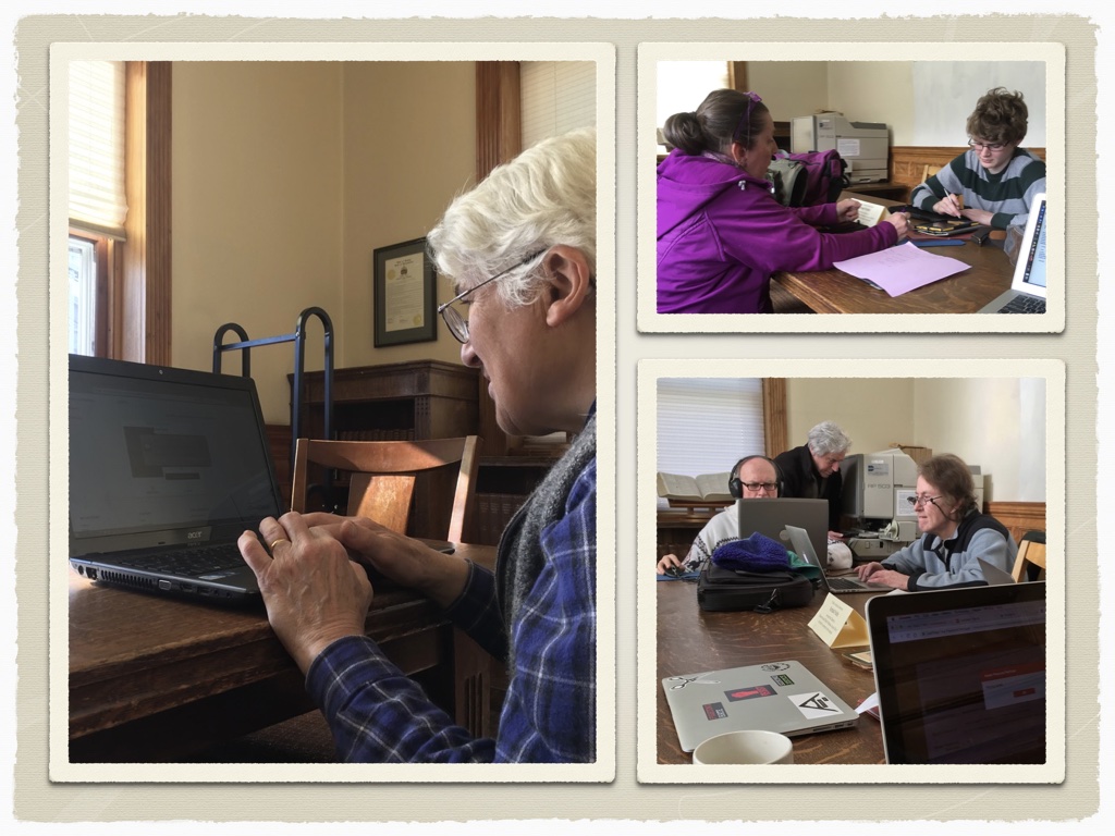 Three different people. White haired woman working on a linux laptop, room with three people doing different thigns on comptuers and one where my intern is working with a woman in purple