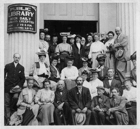 a group of librarians in front of the Natucket Public Library sometime in the early 19th century