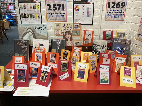A banned books display showing the many different books which were banned last year and the reason for their banning